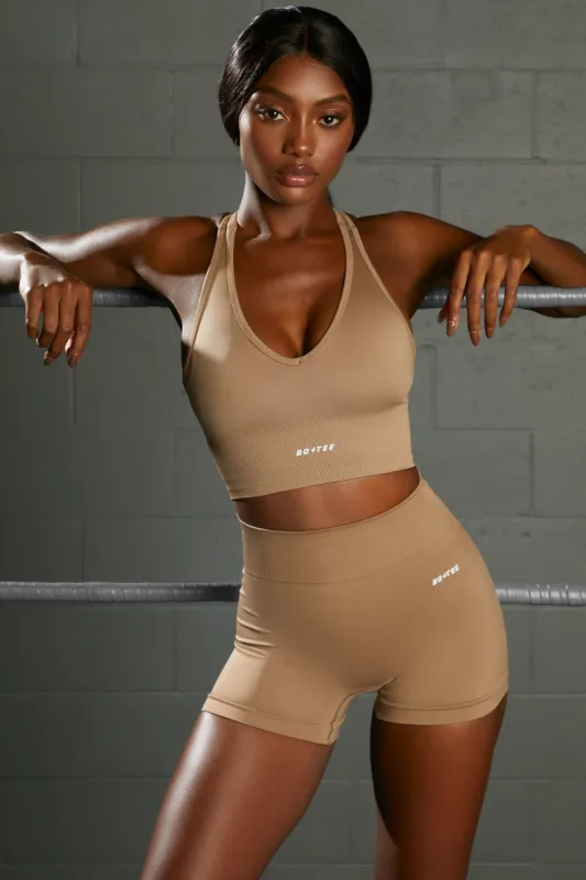 Curved Waist Seamless Mini Shorts in Brown sold by Oh Polly