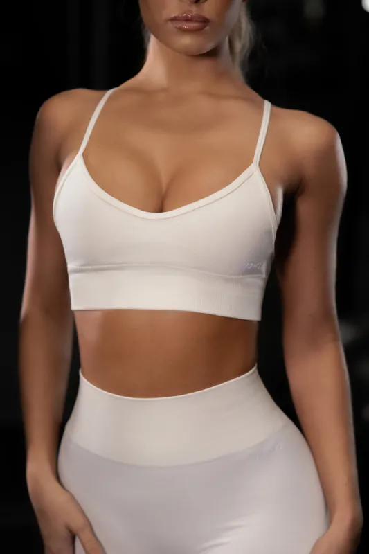 Empower Seamless V Neck Sports Bra in Cream sold by Oh Polly