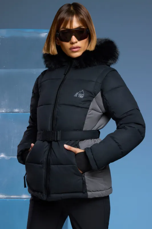 Ski Jacket with Detachable Sleeves in Black sold by Oh Polly