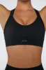 Cross Back Sports Bra in Black sold by Oh Polly