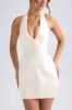 Halterneck Structured Tulip Mini Dress in Ivory sold by Oh Polly