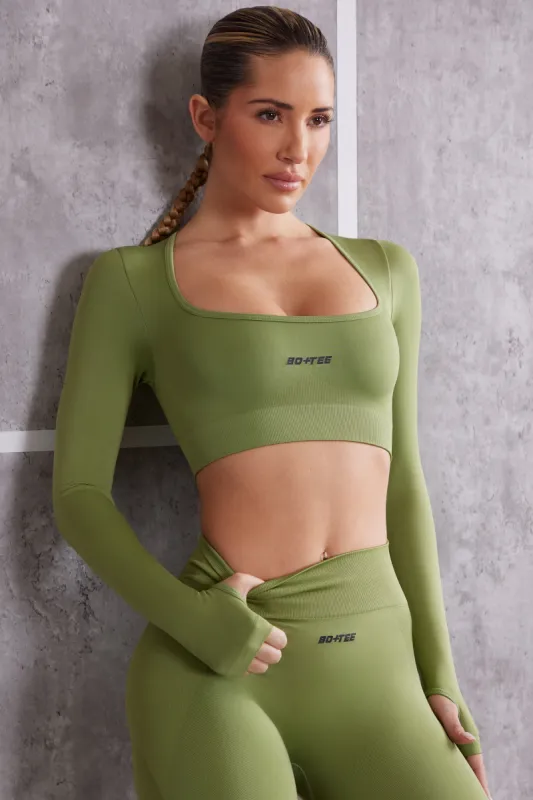 Long Sleeve Crop Top in Olive sold by Oh Polly