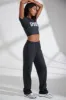 Petite Wide Leg Embroidered Back Joggers in Black sold by Oh Polly