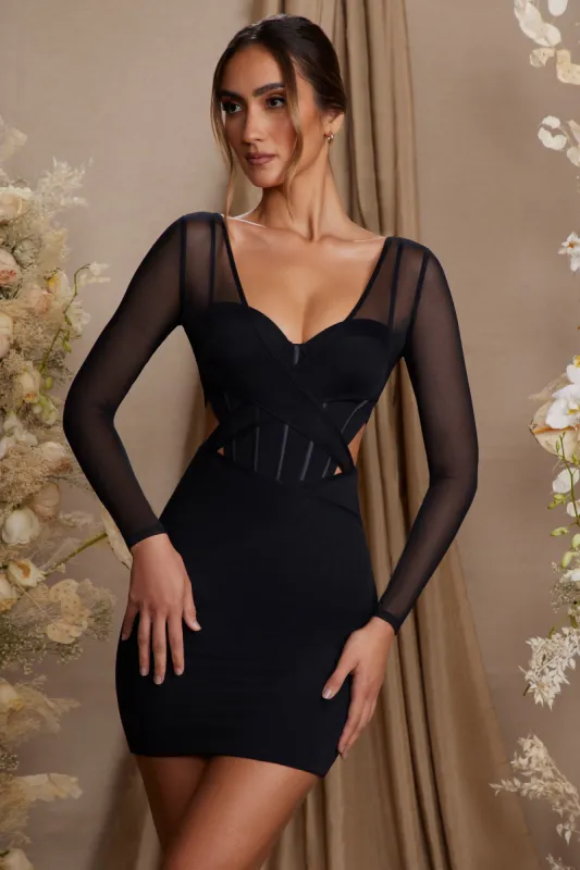 Long Sleeve Layered Corset Mini Dress in Black sold by Oh Polly
