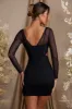 Long Sleeve Layered Corset Mini Dress in Black sold by Oh Polly