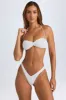 Ruched Cheeky Bikini Bottoms in White sold by Oh Polly