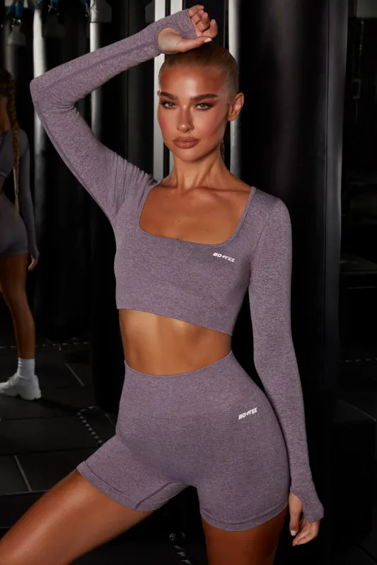 Motion Seamless Long Sleeve Crop Top in Purple sold by Oh Polly