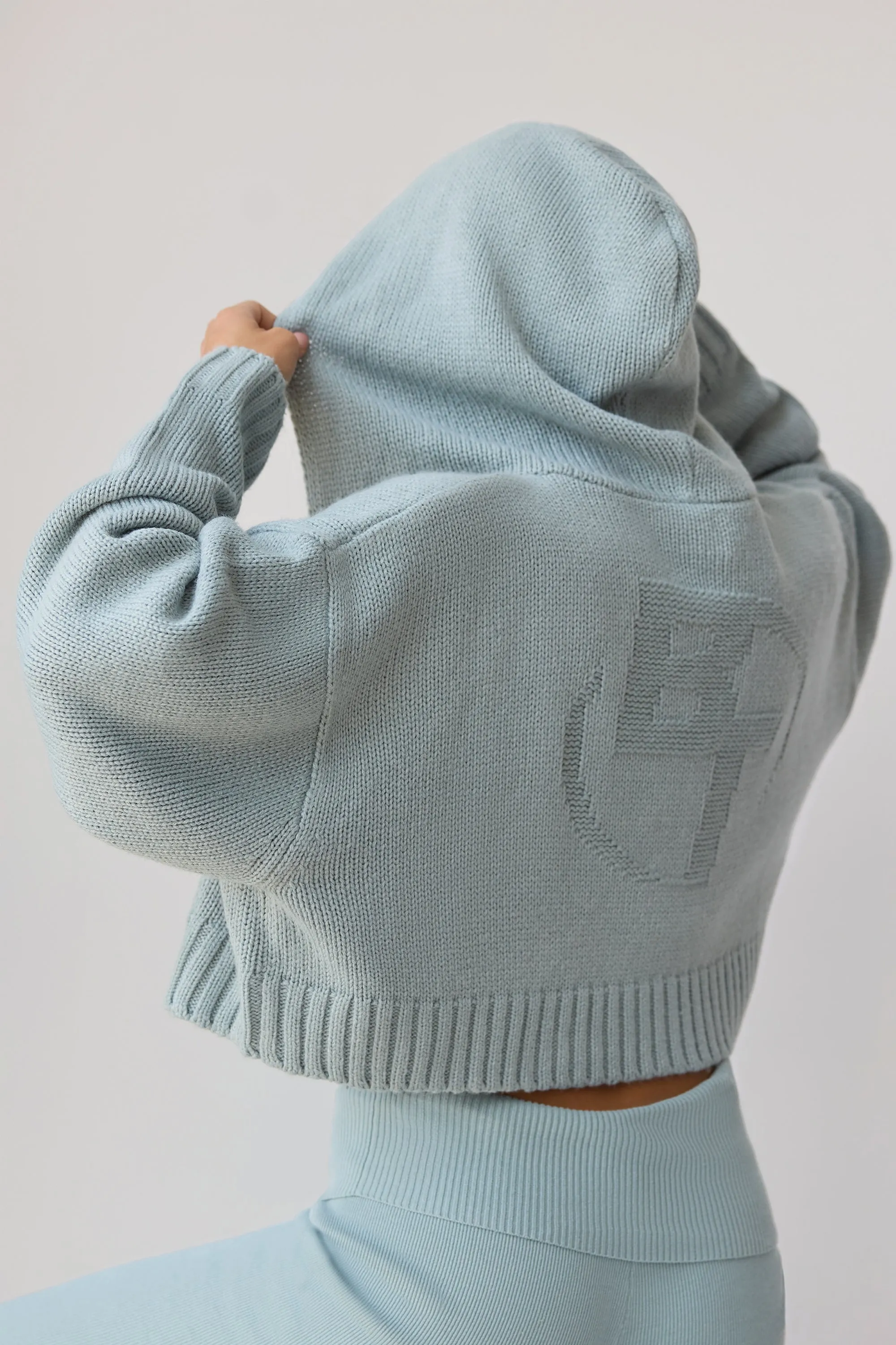 Chunky Knit Zip-Up Cropped Hoodie in Dusty Teal sold by Oh Polly