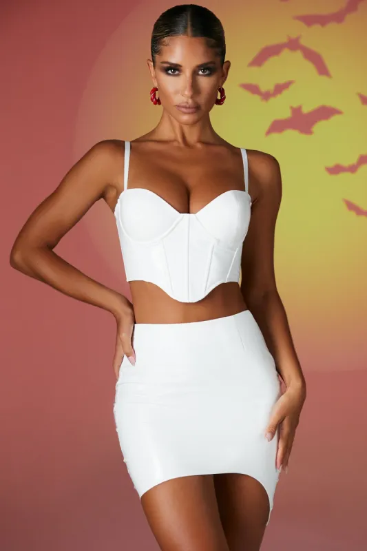 Vinyl Curved Hem Mini Skirt in White sold by Oh Polly