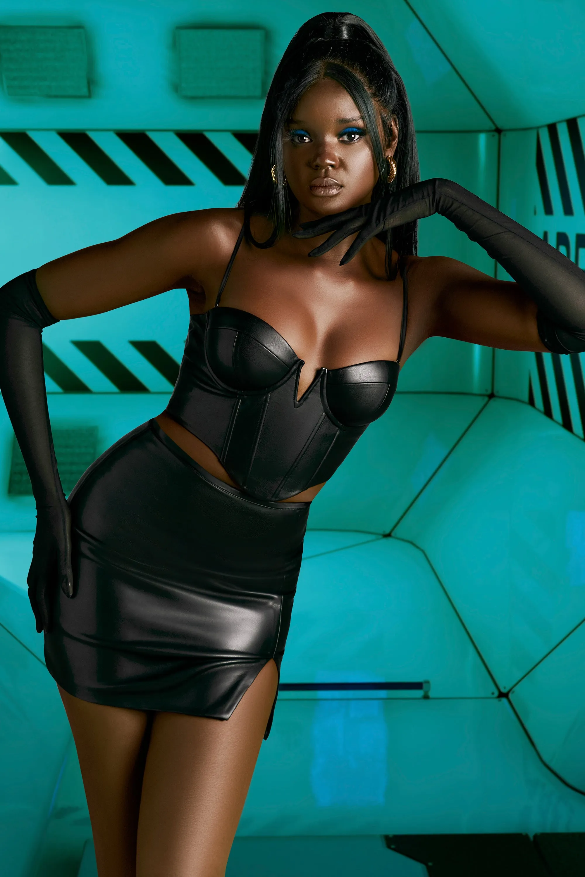 Faux Leather Corset Top in Black sold by Oh Polly