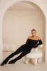 Petite Off The Shoulder Jumpsuit in Black sold by Oh Polly