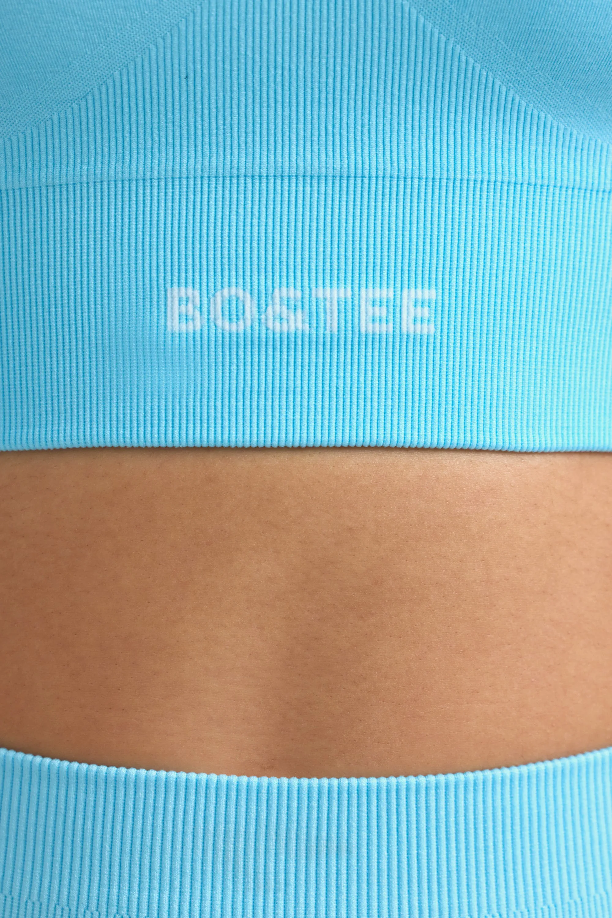 Define Luxe Halterneck Sports Bra in Sky Blue sold by Oh Polly product image thumbnail 4