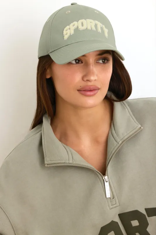 Appliqué Baseball Cap in Mineral sold by Oh Polly