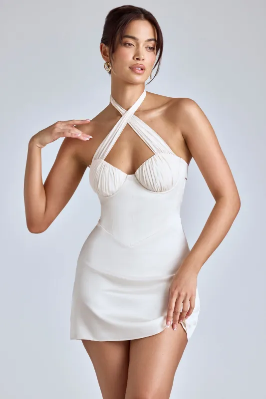 Cross-Neck A-Line Mini Dress in Ivory sold by Oh Polly