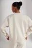 Oversized Sweatshirt in Heather Oat sold by Oh Polly
