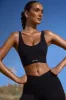 Plunge Neck Open Back FlexiRib Sports Bra in Black sold by Oh Polly