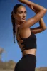 Plunge Neck Open Back FlexiRib Sports Bra in Black sold by Oh Polly