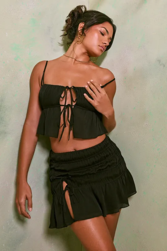 Shirred Thigh High Split Mid Rise Mini Skirt in Black sold by Oh Polly