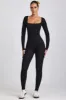 Ribbed Modal Long Sleeve Jumpsuit in Black sold by Oh Polly