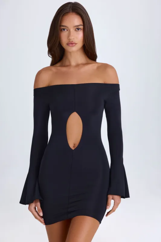 Off-Shoulder Cut-Out Mini Dress in Black sold by Oh Polly