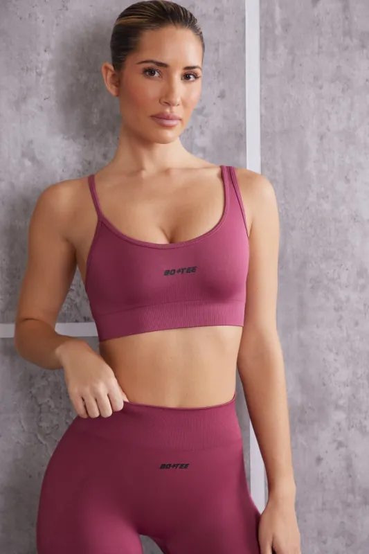 Asymmetric Sports Bra in Dark Rose sold by Oh Polly