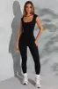 Petite Open Back Scoop Neck Jumpsuit in Black sold by Oh Polly