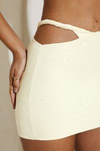 Asymmetric Twist Detail Mini Skirt in Ivory sold by Oh Polly