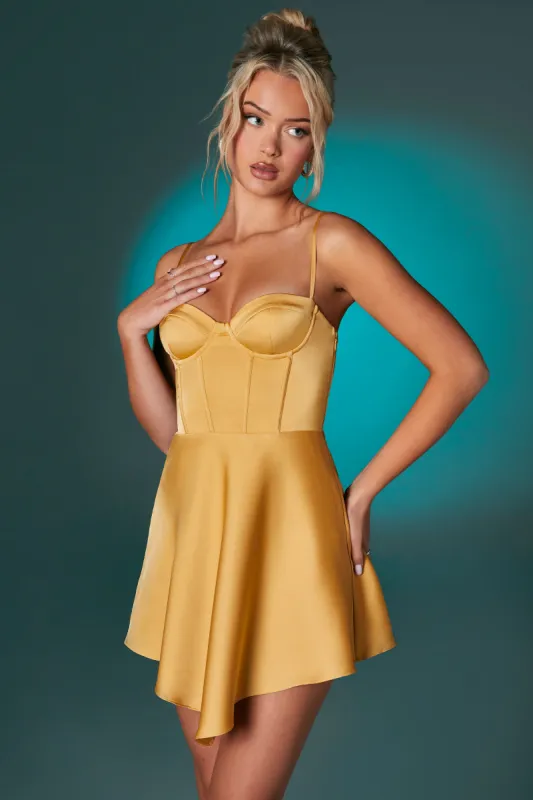 Asymmetric Hem Corset Mini Dress in Gold sold by Oh Polly