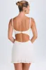 Ruffle-Appliqué Cut-Out Mini Dress in White sold by Oh Polly