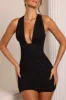 Embellished Plunge Neck Mini Dress in Black sold by Oh Polly