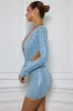 Embellished Cut-Out Mini Dress in Light Blue sold by Oh Polly