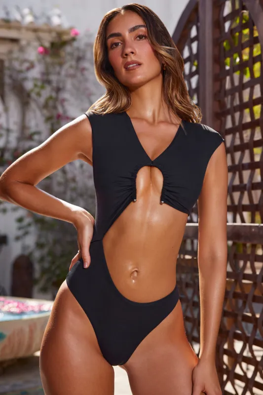 V Neck Cut Out One Piece in Black sold by Oh Polly