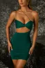 Asymmetric Mini Dress in Emerald Green sold by Oh Polly