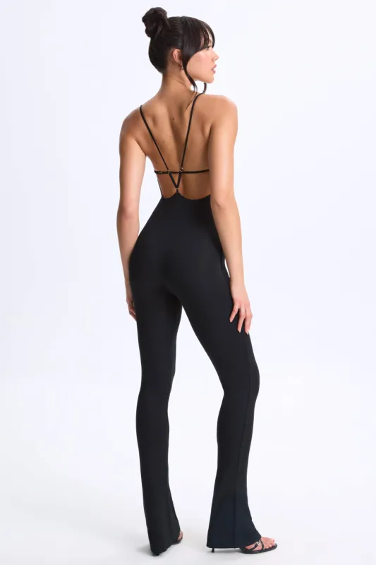 Tall Plunge Open-Back Flared Jumpsuit in Black sold by Oh Polly