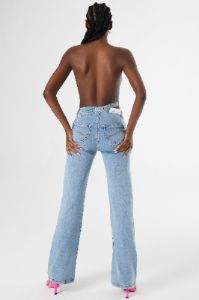 Mid Rise Flared Jeans in Medium Blue Wash sold by Oh Polly
