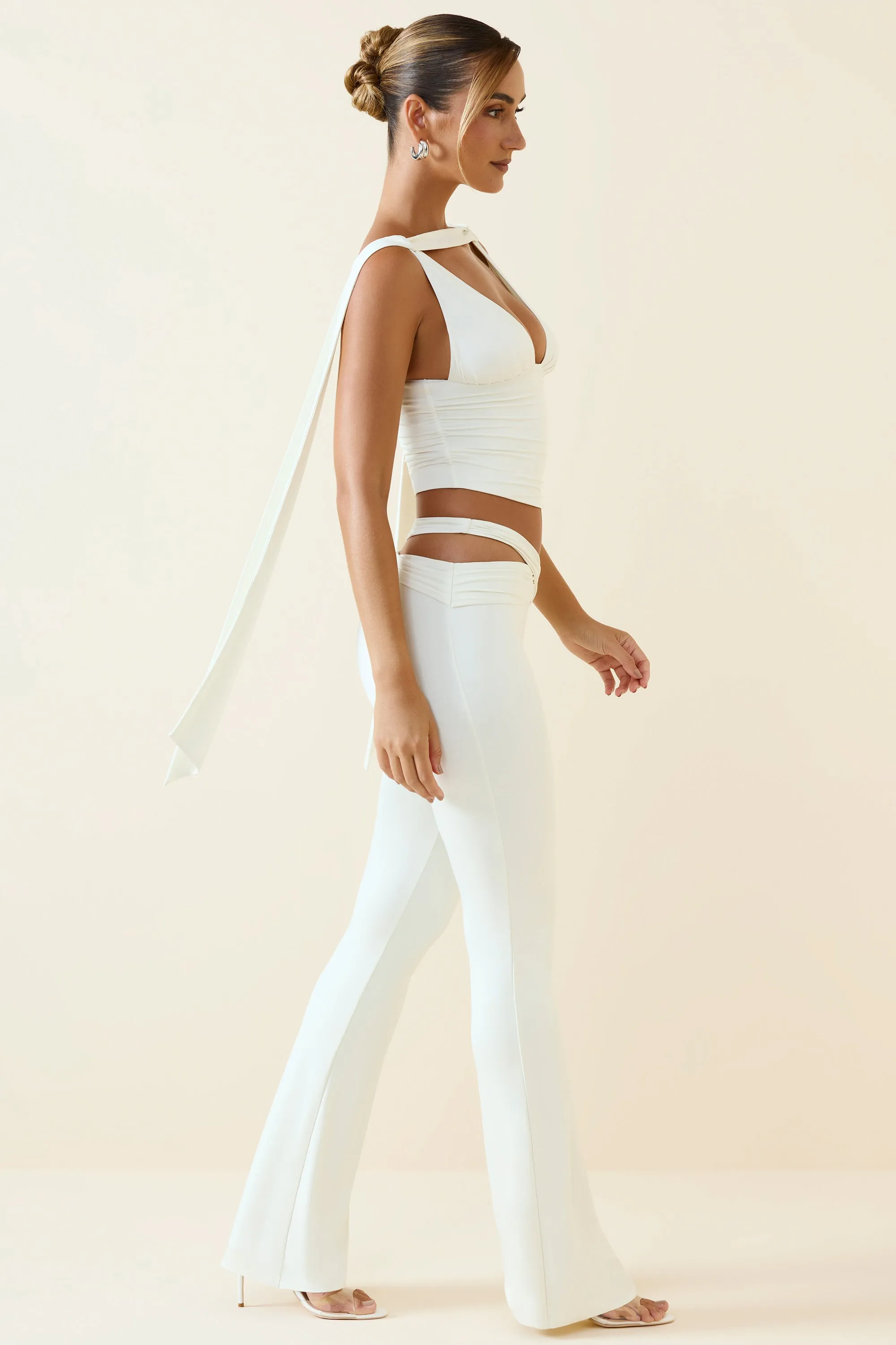 Tall Cut-Out Mid-Rise Flared Trousers in Vanilla sold by Oh Polly product image thumbnail 3