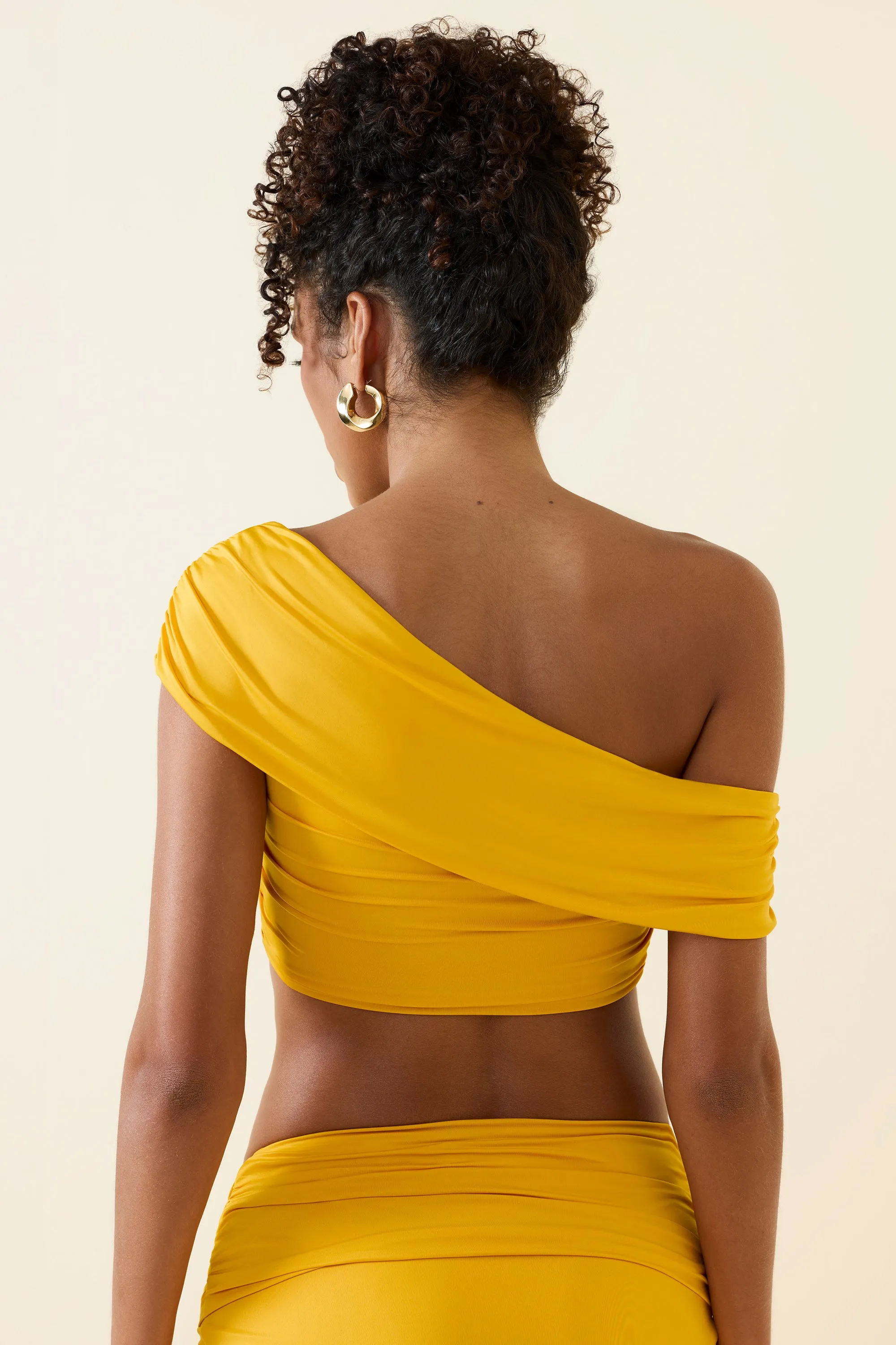 Asymmetric Ruched Off-Shoulder Crop Top in Golden Yellow sold by Oh Polly product image thumbnail 2