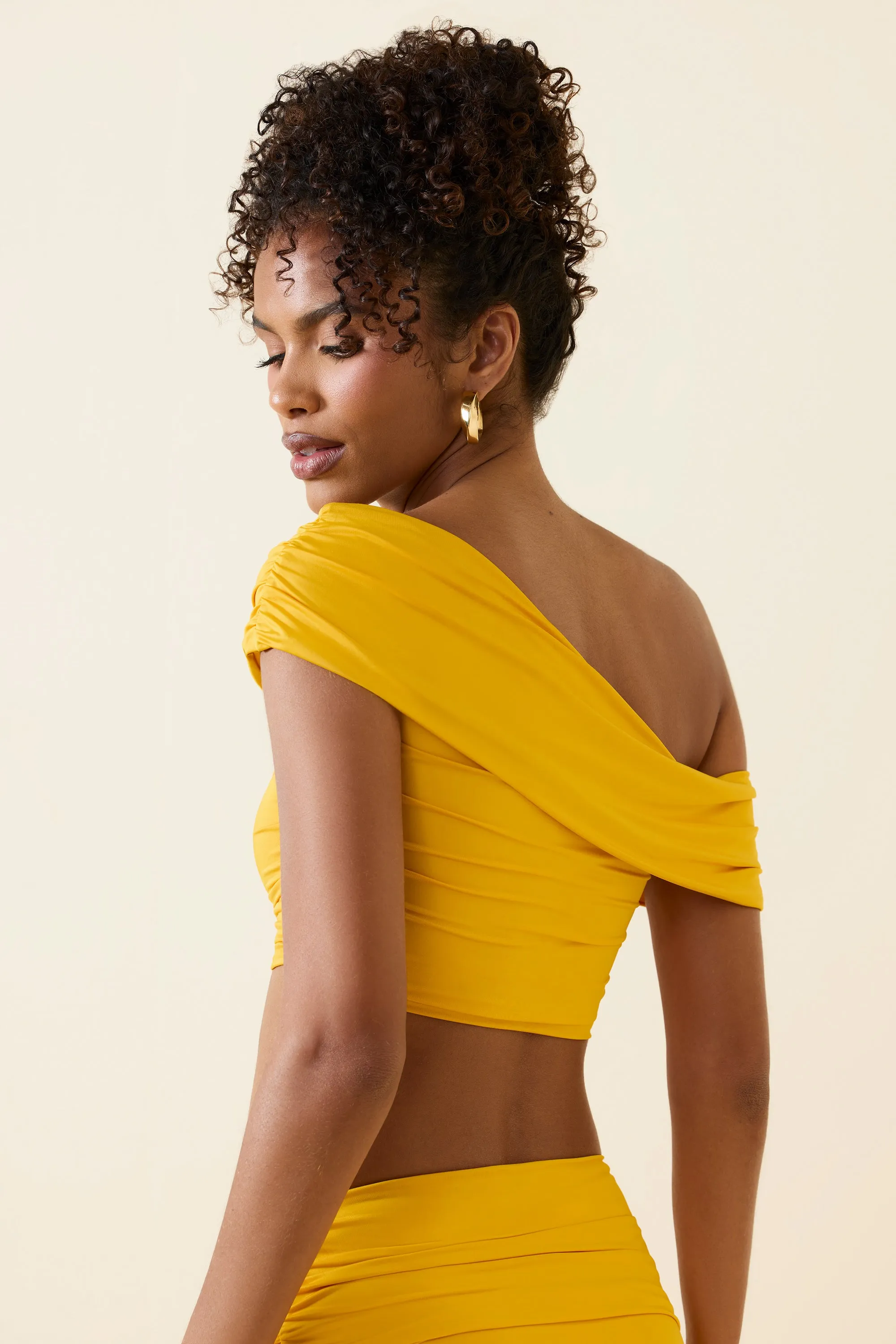 Asymmetric Ruched Off-Shoulder Crop Top in Golden Yellow sold by Oh Polly product image thumbnail 5