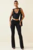 Petite Cut-Out Mid-Rise Flared Trousers in Black sold by Oh Polly