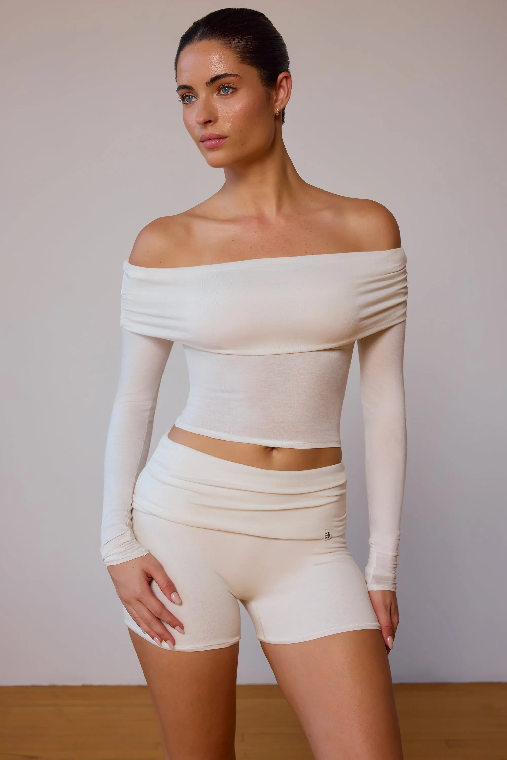 Sheer Off-Shoulder Long-Sleeve Top in Soft White sold by Oh Polly