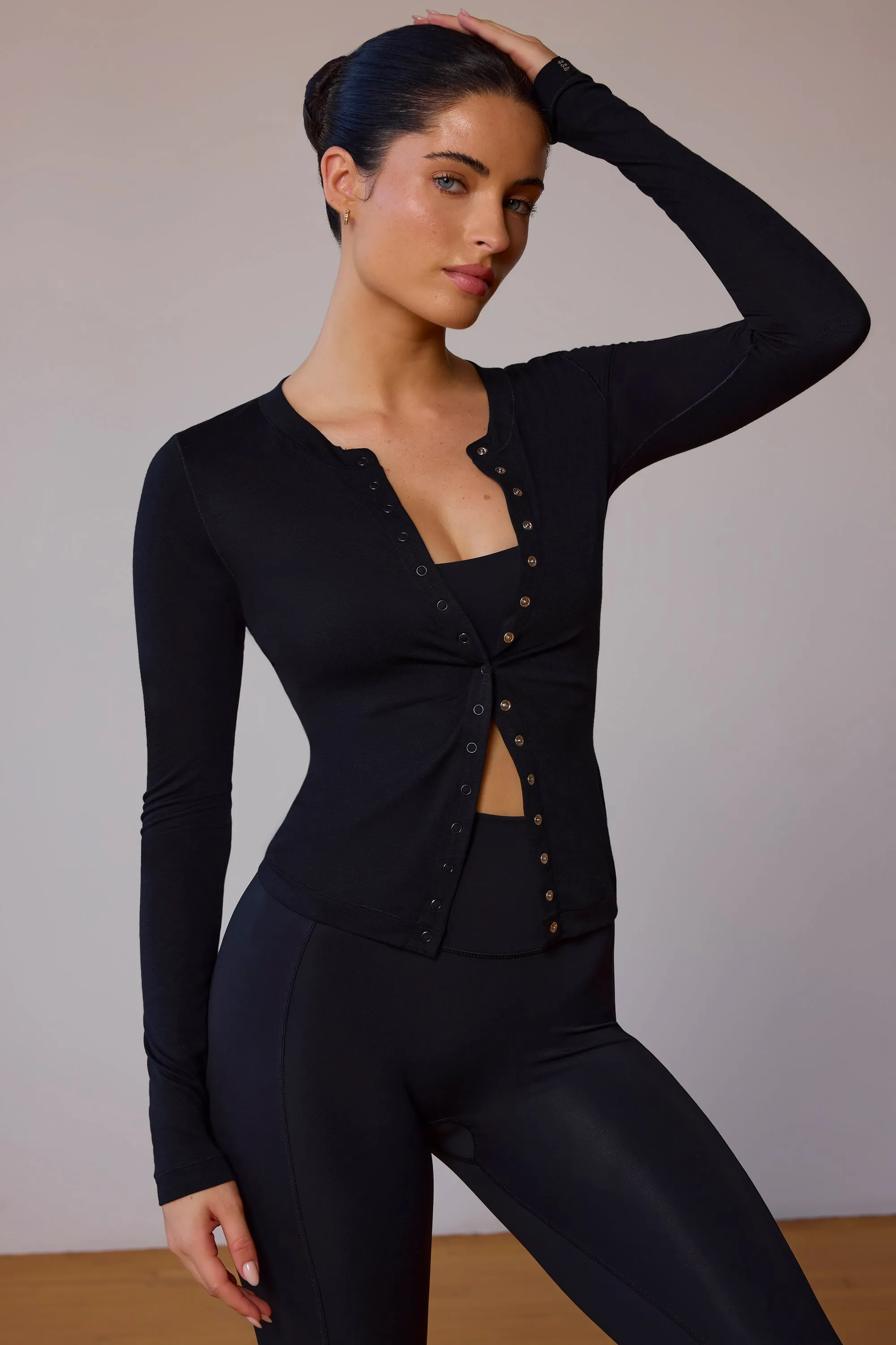 Full-Length Cardigan in Black sold by Oh Polly