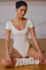 Backless Panelled Bodysuit in Soft White sold by Oh Polly