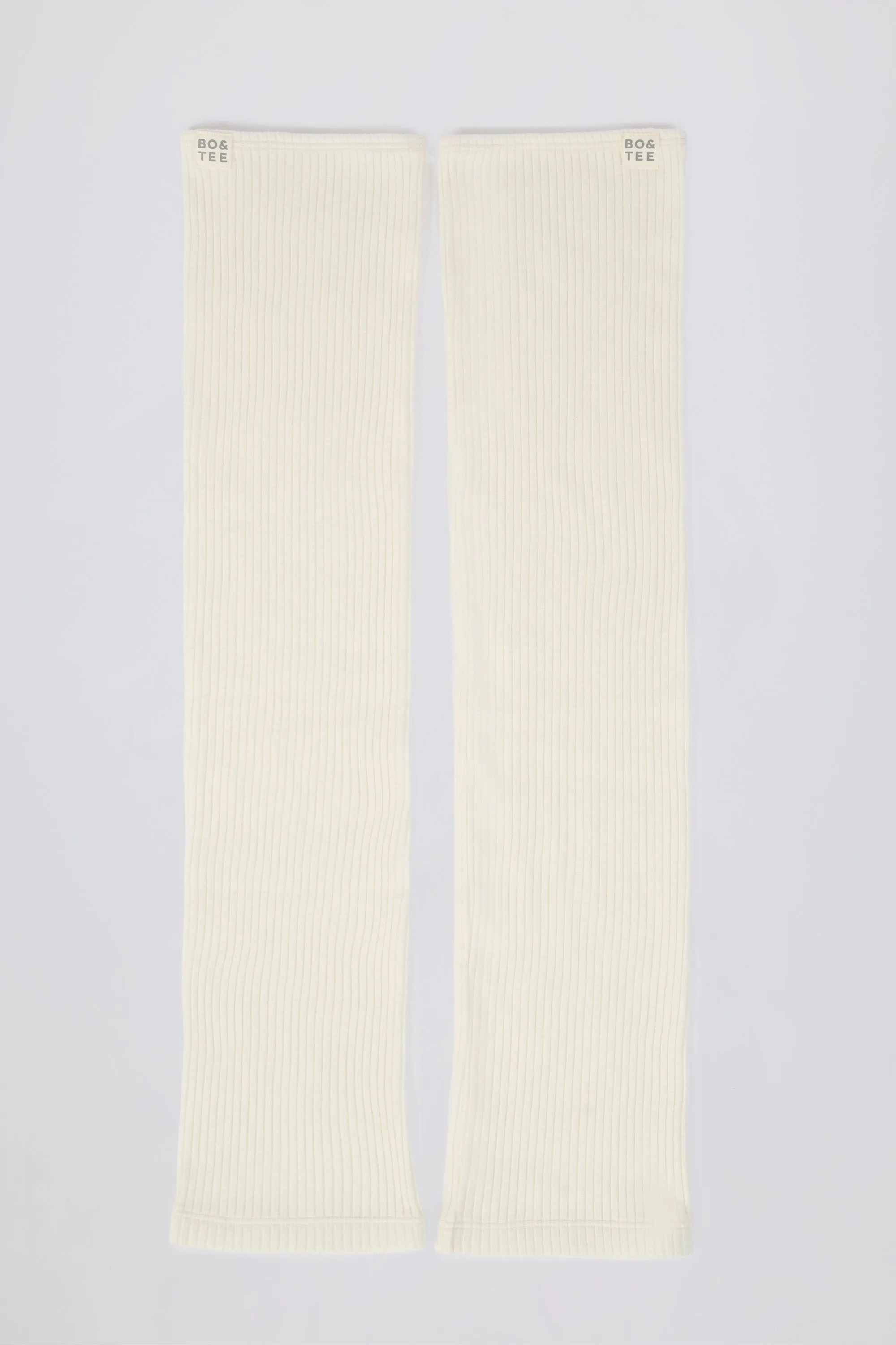 Leg Warmers in Soft White sold by Oh Polly