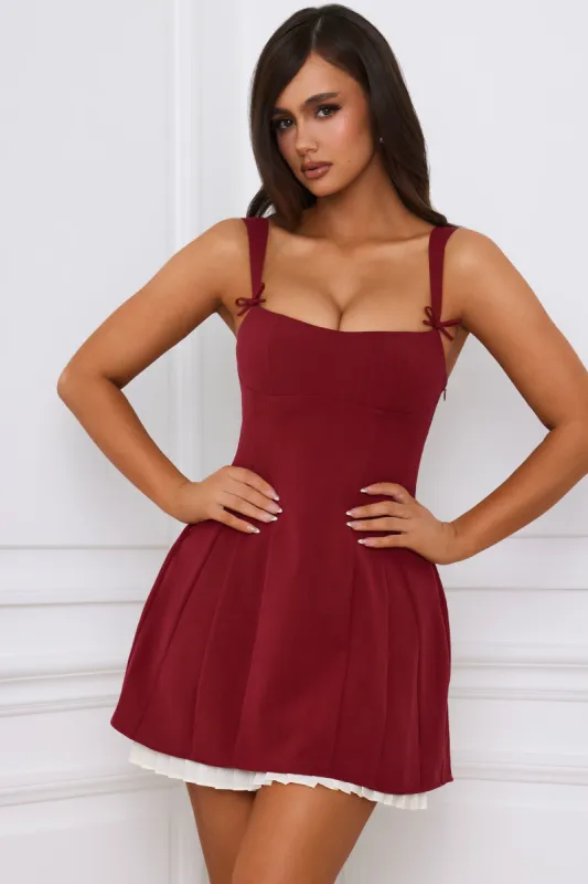 Bow-Detail Pleated A-Line Mini Dress in Berry Red sold by Oh Polly