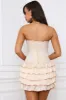 Bandeau Ruffled Tiered Corset Mini Dress in Ivory sold by Oh Polly