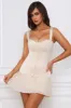 Bow-Detail Lace-Up Corset Mini Dress in Ivory sold by Oh Polly