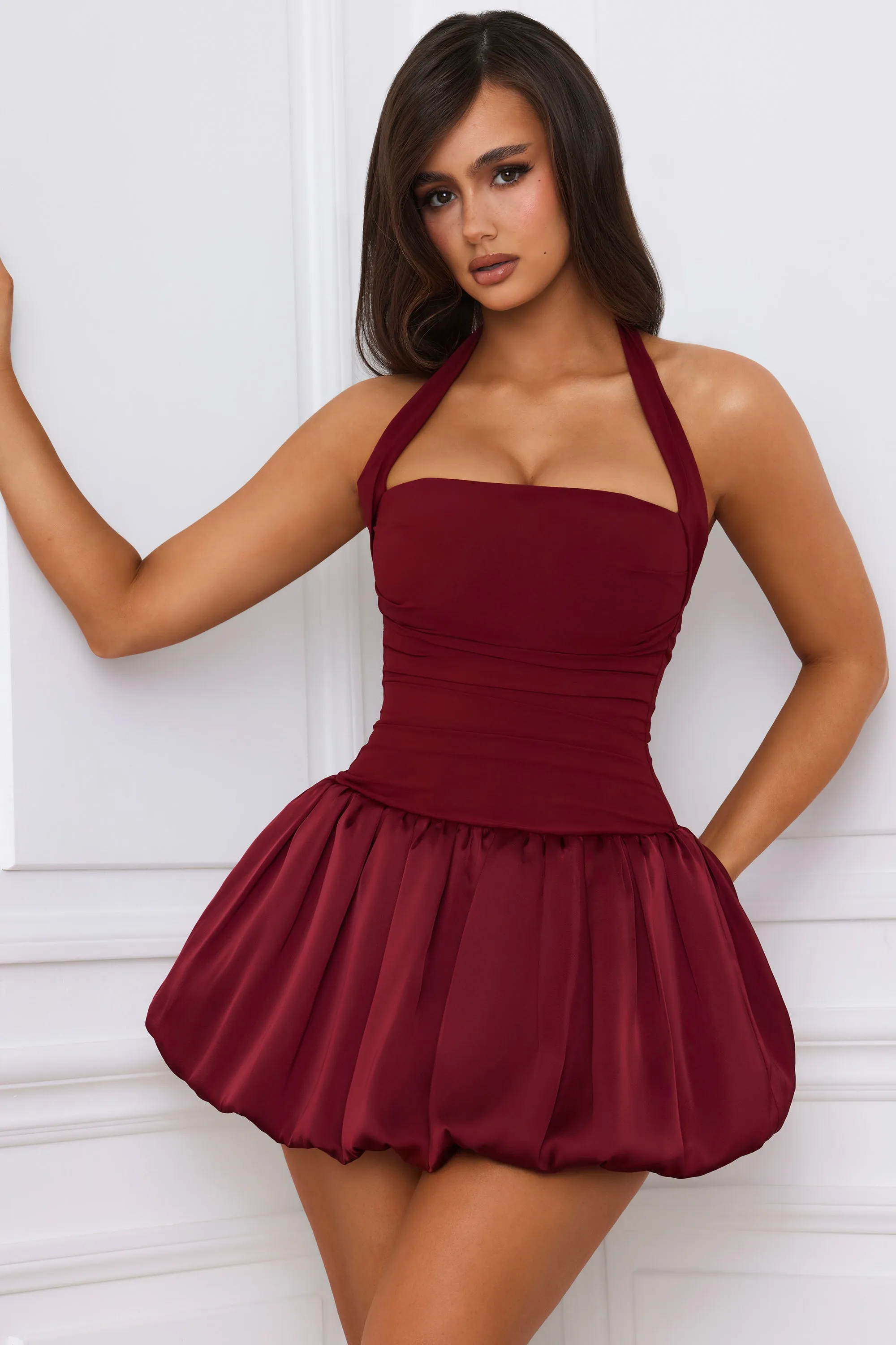 Halterneck Lace-Up Bubble Hem Corset Micro Mini Dress in Berry Red sold by Oh Polly