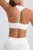Super Sculpt Seamless T-Back Sports Bra in Eggshell sold by Oh Polly