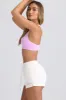 Mid-Rise Sweat Shorts in Eggshell sold by Oh Polly