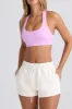 Mid-Rise Sweat Shorts in Eggshell sold by Oh Polly